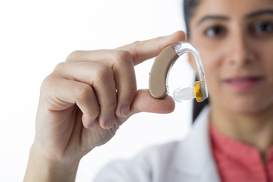 Will hearing aids completely restore my hearing to normal?